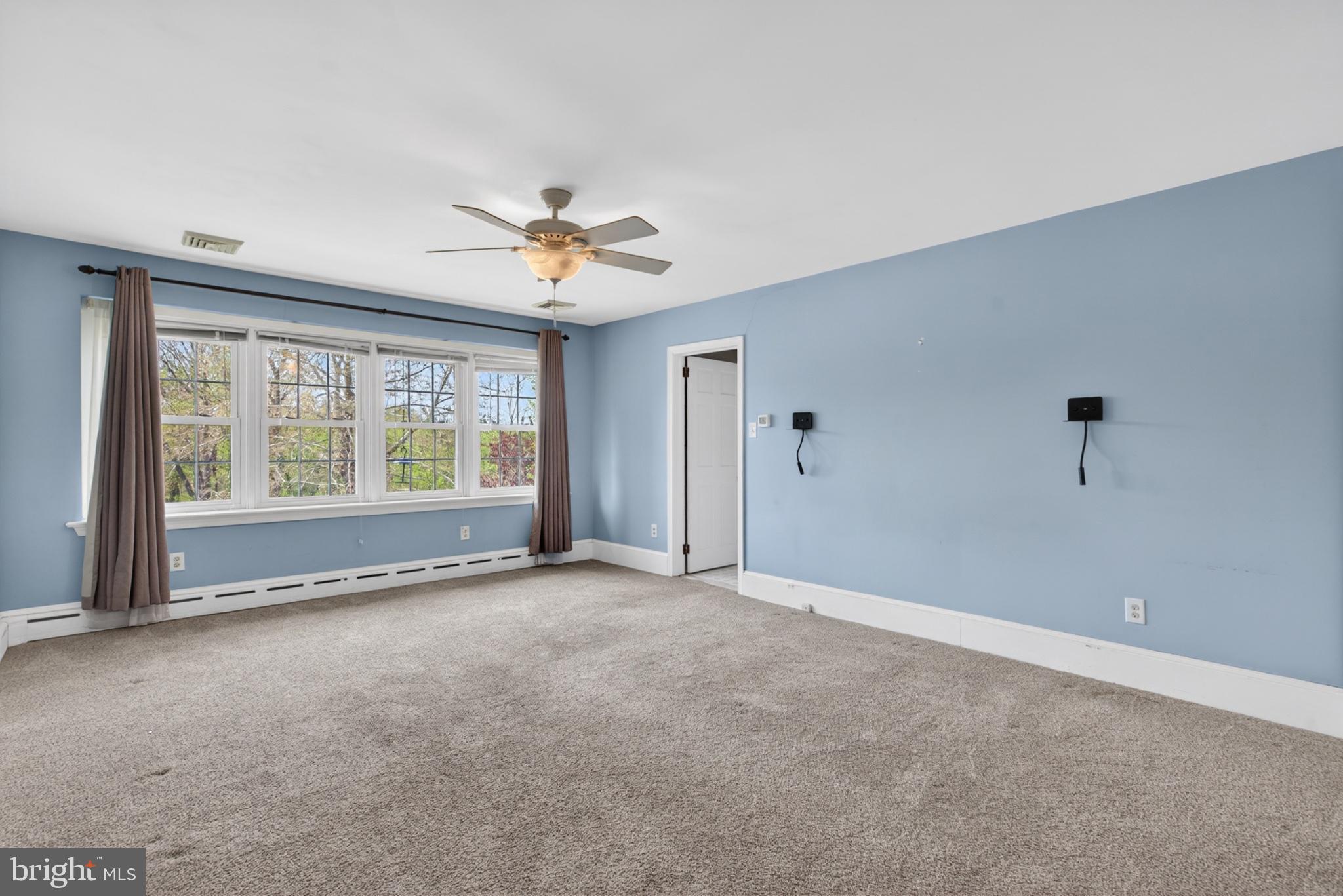 300 Sanatoga Road Pottstown, PA 19465 - Photo 33 of 79 Spacious room with serene blue walls.