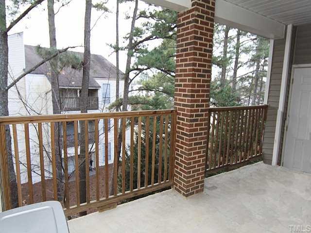 7024 Sandy Forks Road, Unit 301 Raleigh, NC 27615 - Photo 9 of 11 a view of a balcony with an outdoor space