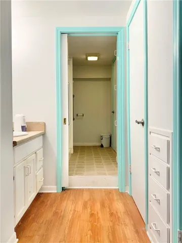 a bathroom with a sink and a mirror