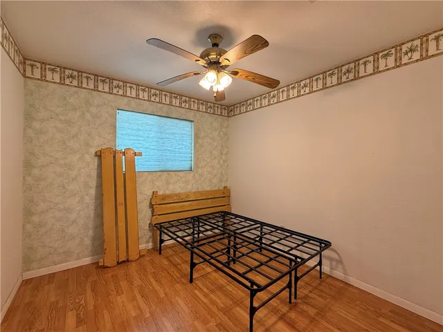 a room with table and wooden floor