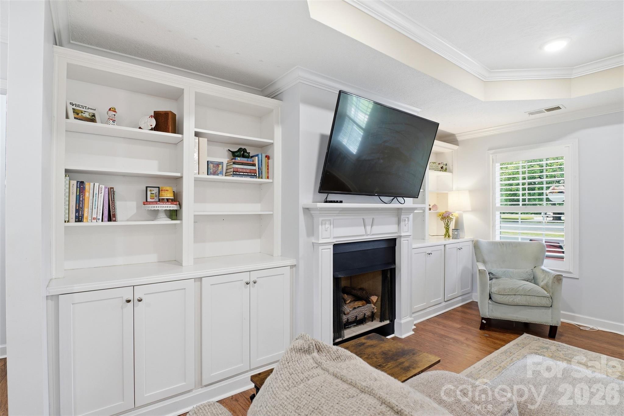 810 Tirzah Road York, SC 29745 - Photo 9 of 29 a living room with furniture a flat screen tv and a fireplace