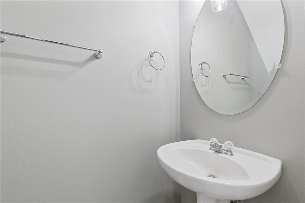 2566 Walden Lake Drive Decatur, GA 30035 - Photo 14 of 30 a bathroom with a sink a mirror and vanity