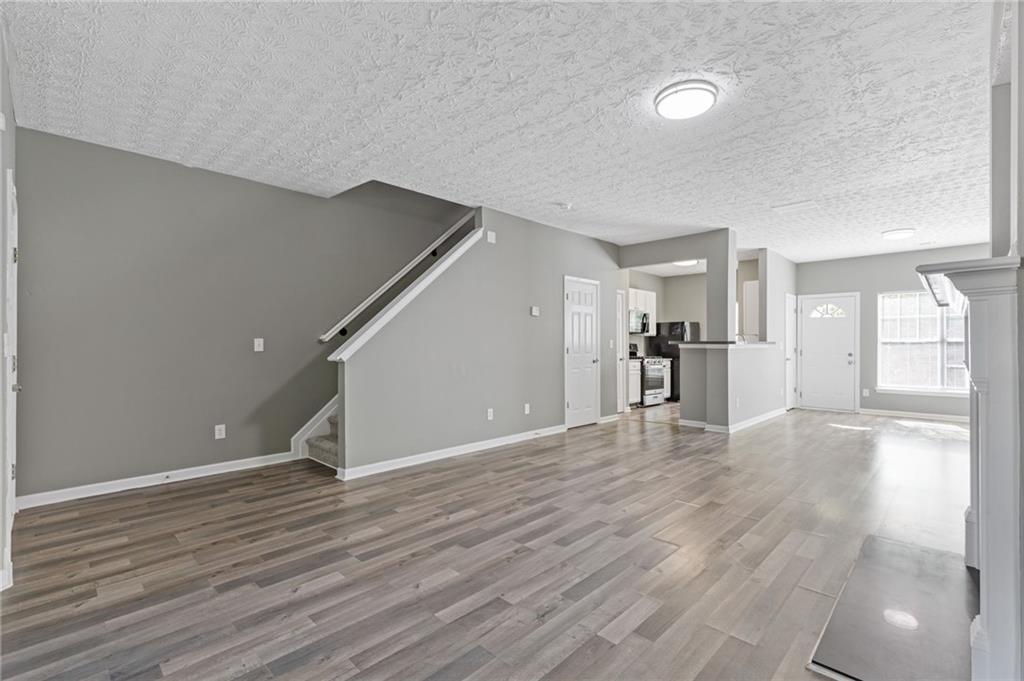 2566 Walden Lake Drive Decatur, GA 30035 - Photo 15 of 30 a view of empty room with wooden floor