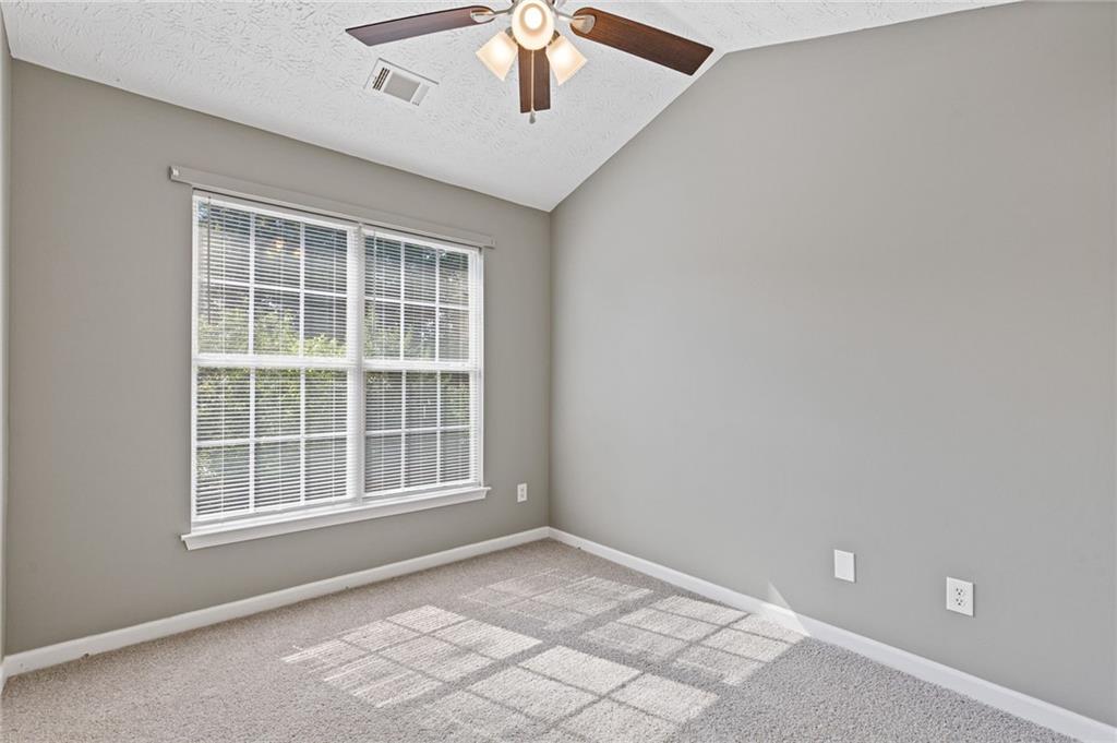 2566 Walden Lake Drive Decatur, GA 30035 - Photo 16 of 30 a view of an empty room with a window