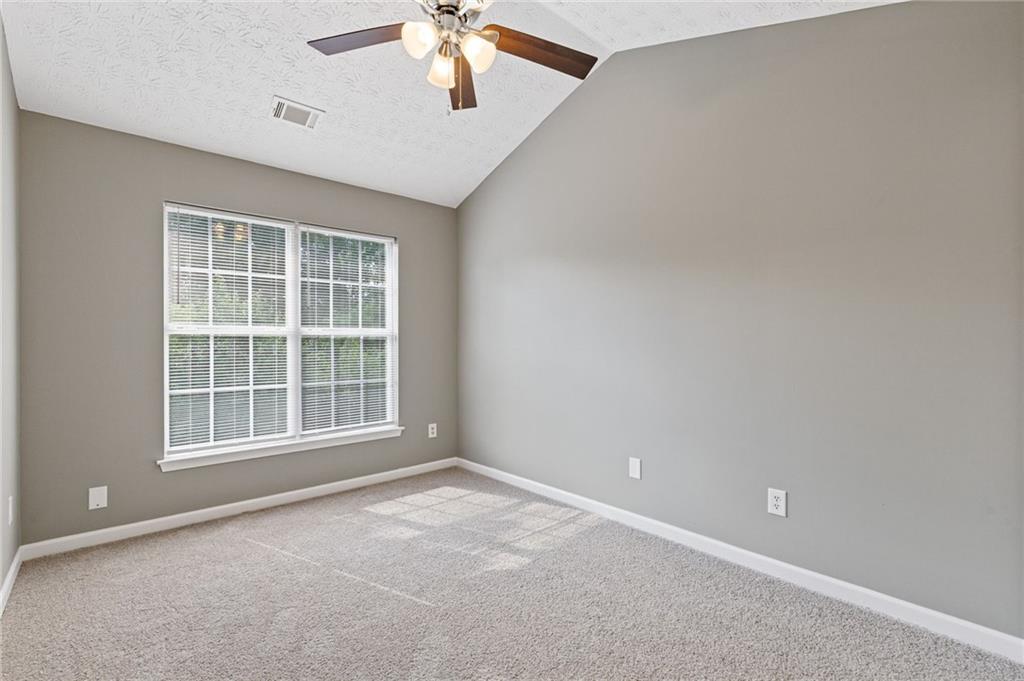 2566 Walden Lake Drive Decatur, GA 30035 - Photo 18 of 30 an empty room with a window