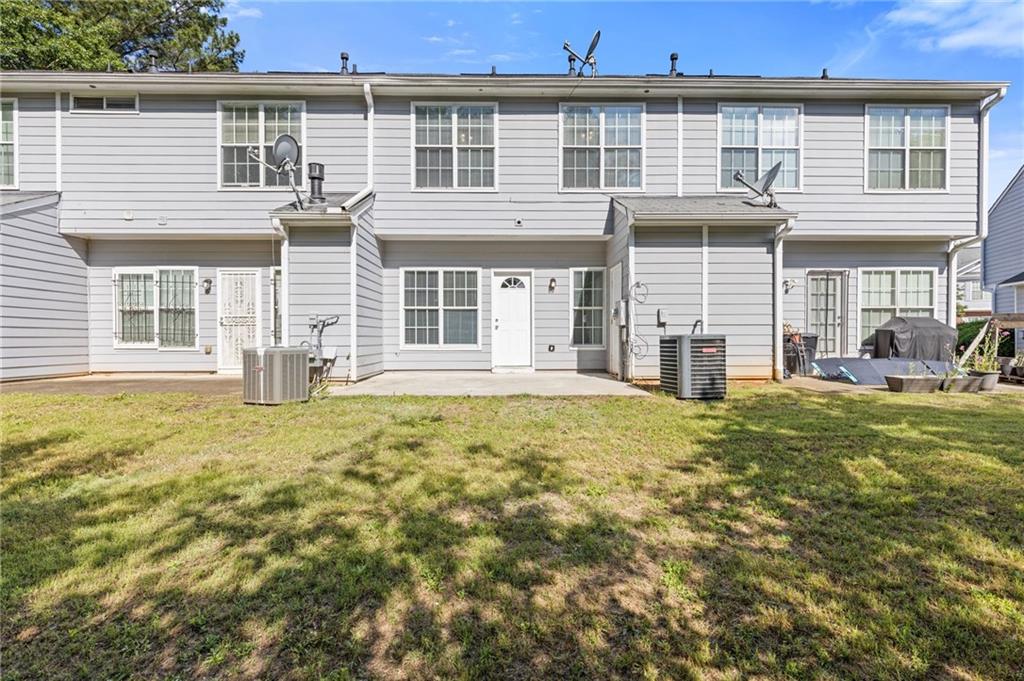 2566 Walden Lake Drive Decatur, GA 30035 - Photo 27 of 30 a view of a house with a backyard