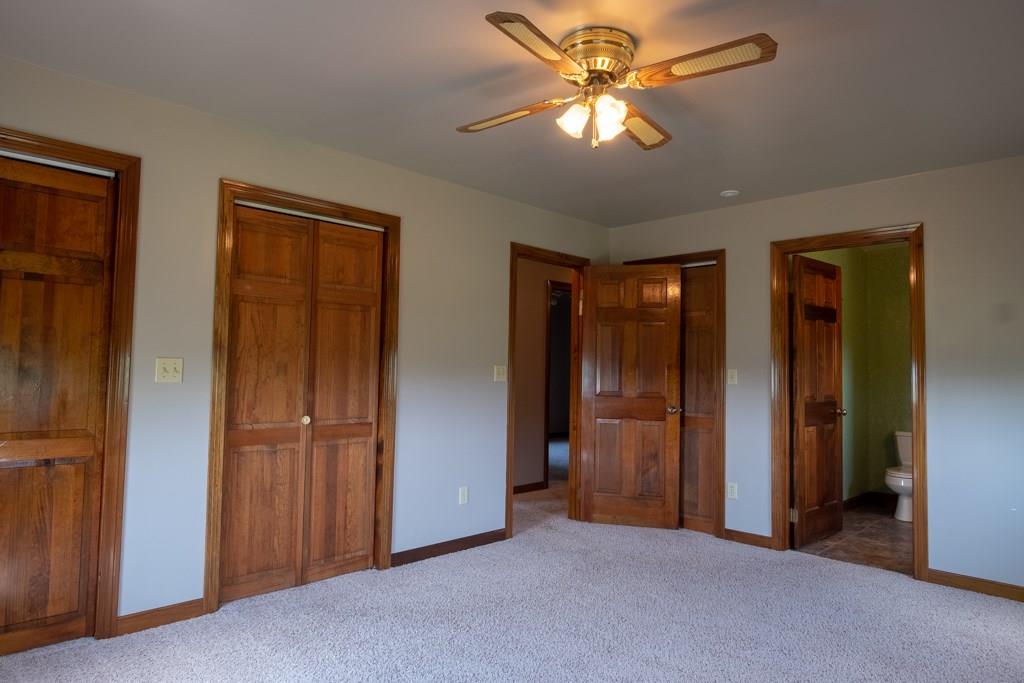 572 Harmony Road New Brighton, PA 15066 - Photo 12 of 24 Master bedroom with plenty of closet space and beautiful wood accents.