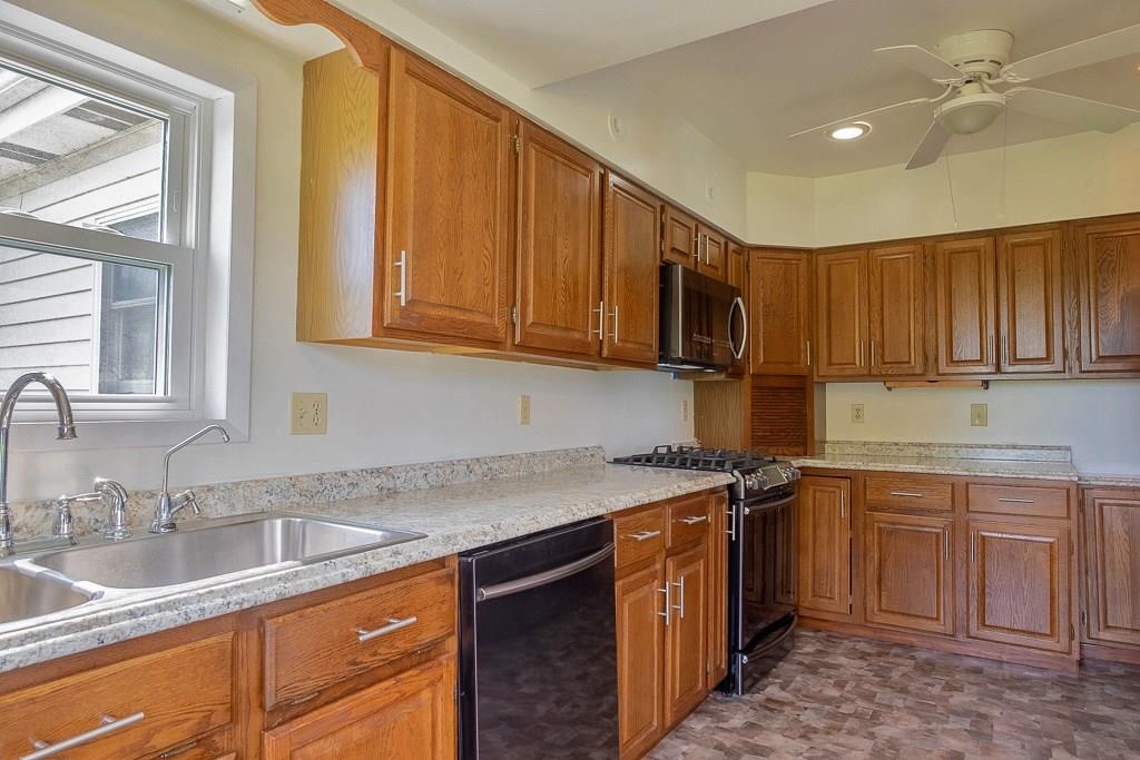 572 Harmony Road New Brighton, PA 15066 - Photo 4 of 24 Plenty of space for all your cooking needs on these new counter tops.