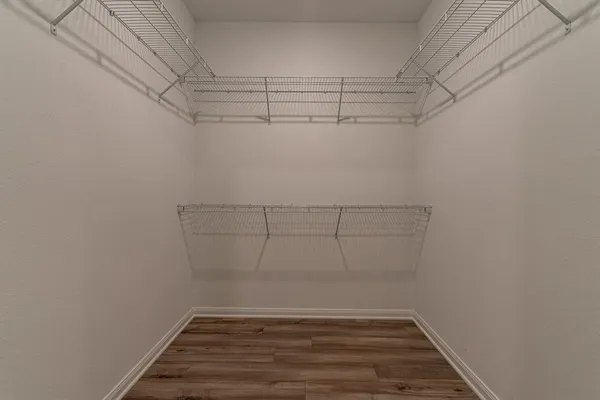 a view of a room with racks on the wall
