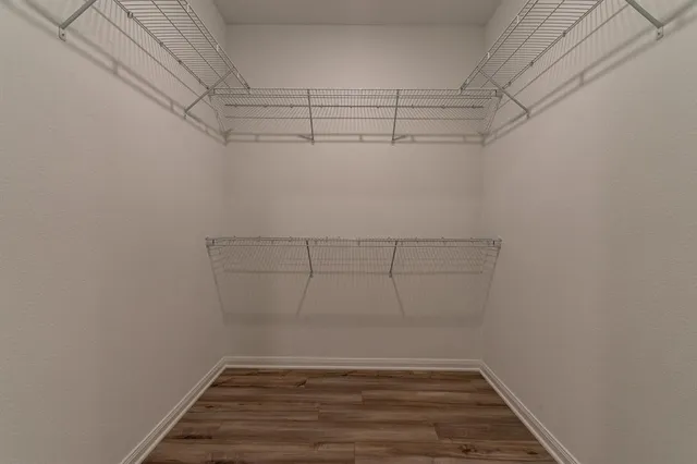 a view of a room with racks on the wall