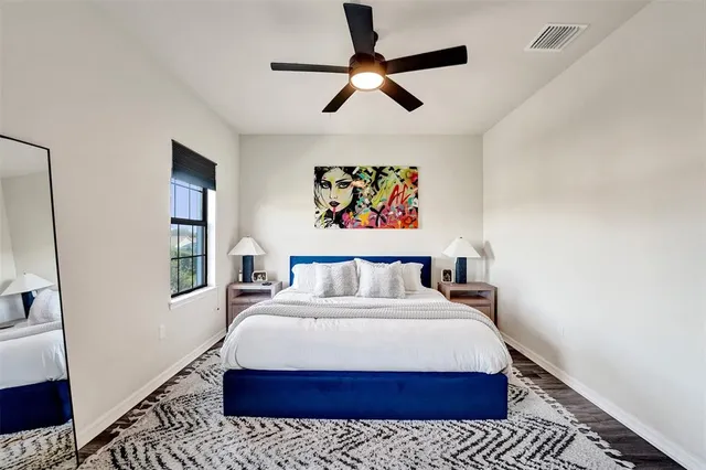 a bathroom with a sink vanity view and a mirror