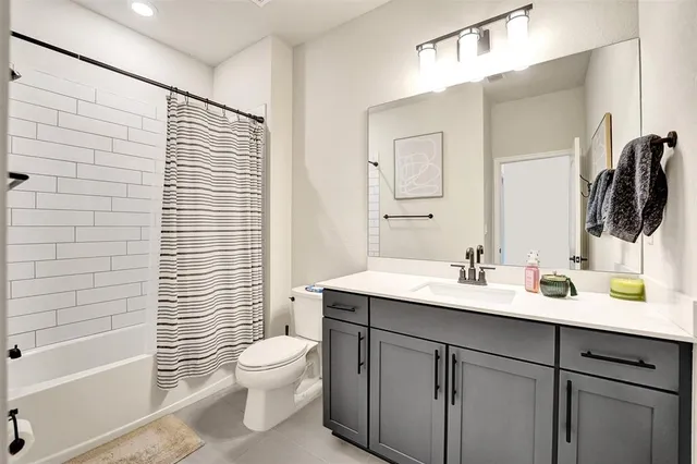 a view of a patio with table and chairs and wooden floor
