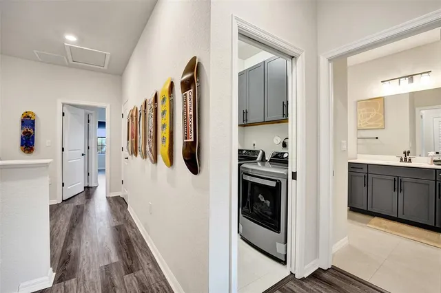 a front view of a house with a yard and a garage
