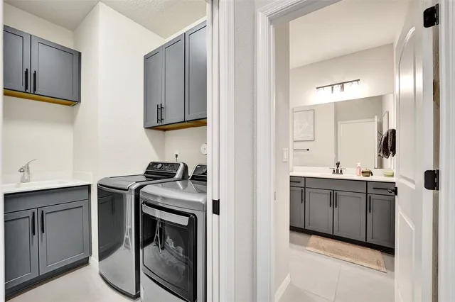 an aerial view of a houses with outdoor space