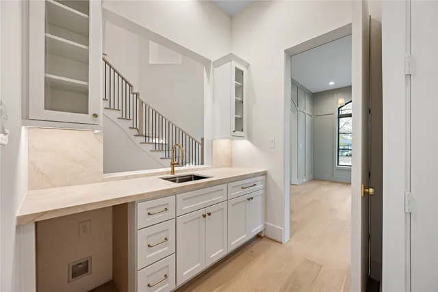 a view of storage and utility room with washer and dryer