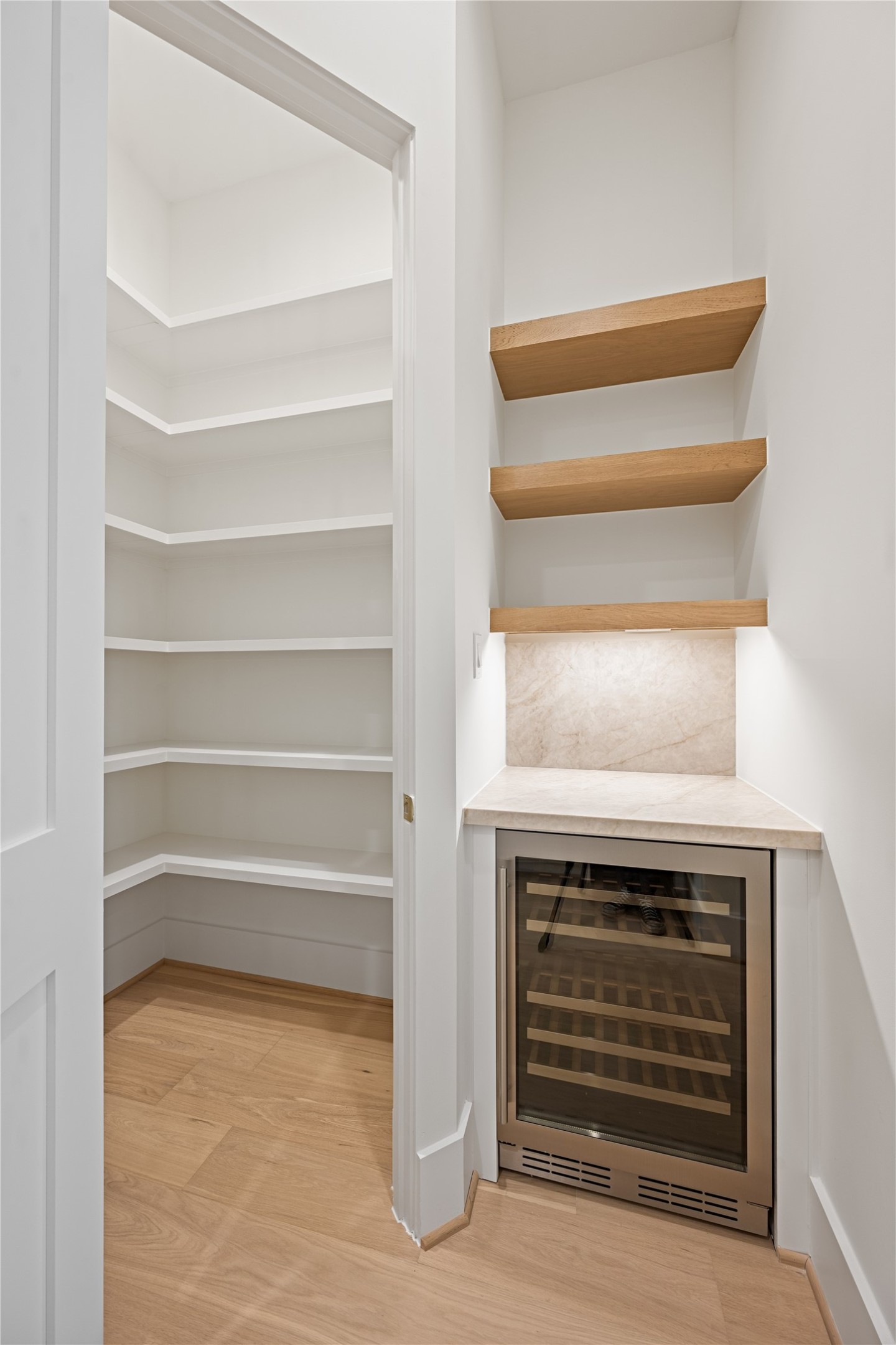 1441 Chamboard Lane Houston, TX 77018 - Photo 19 of 46 a view of storage and utility room with washer and dryer