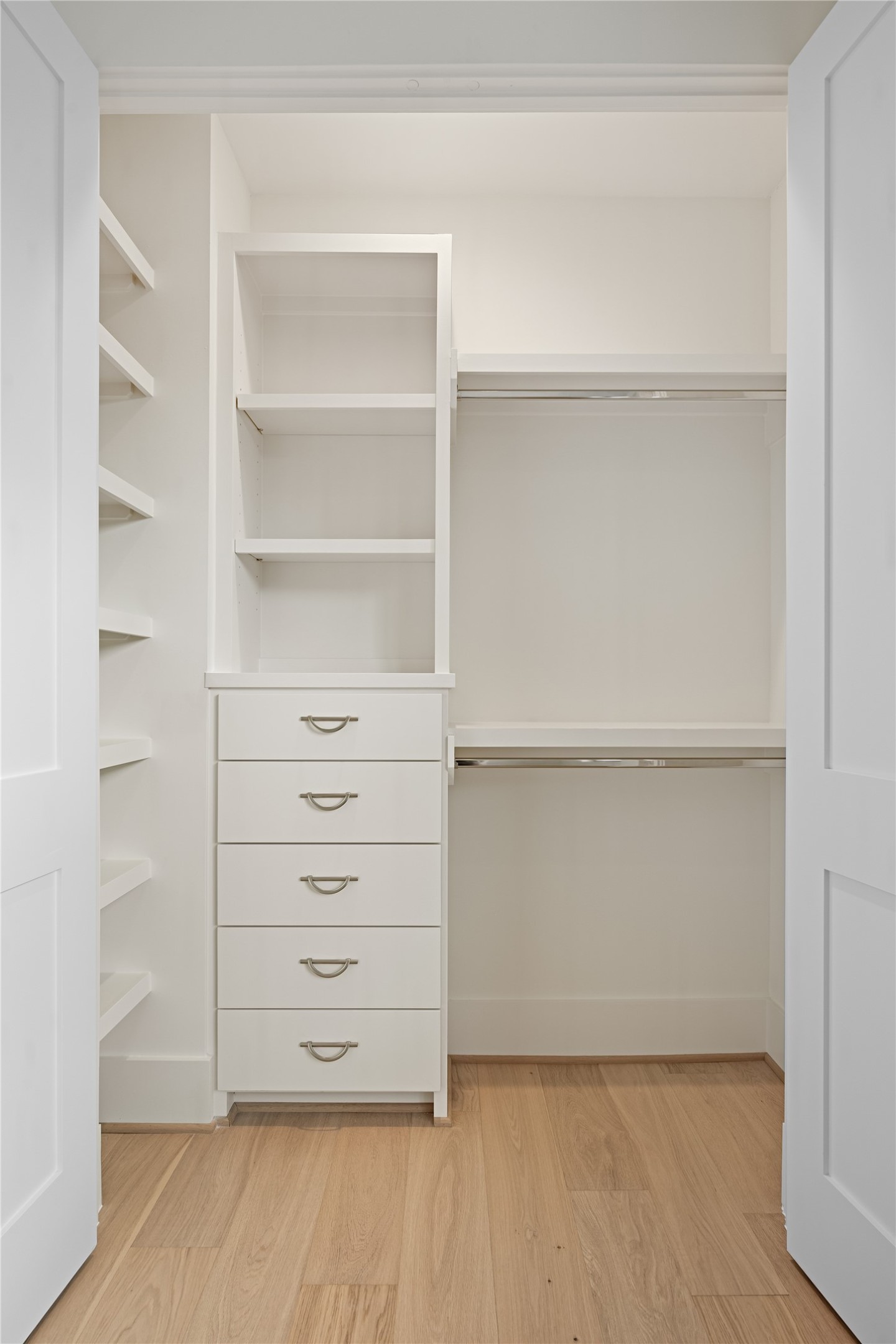 1441 Chamboard Lane Houston, TX 77018 - Photo 27 of 46 a view of walk in closet with empty racks