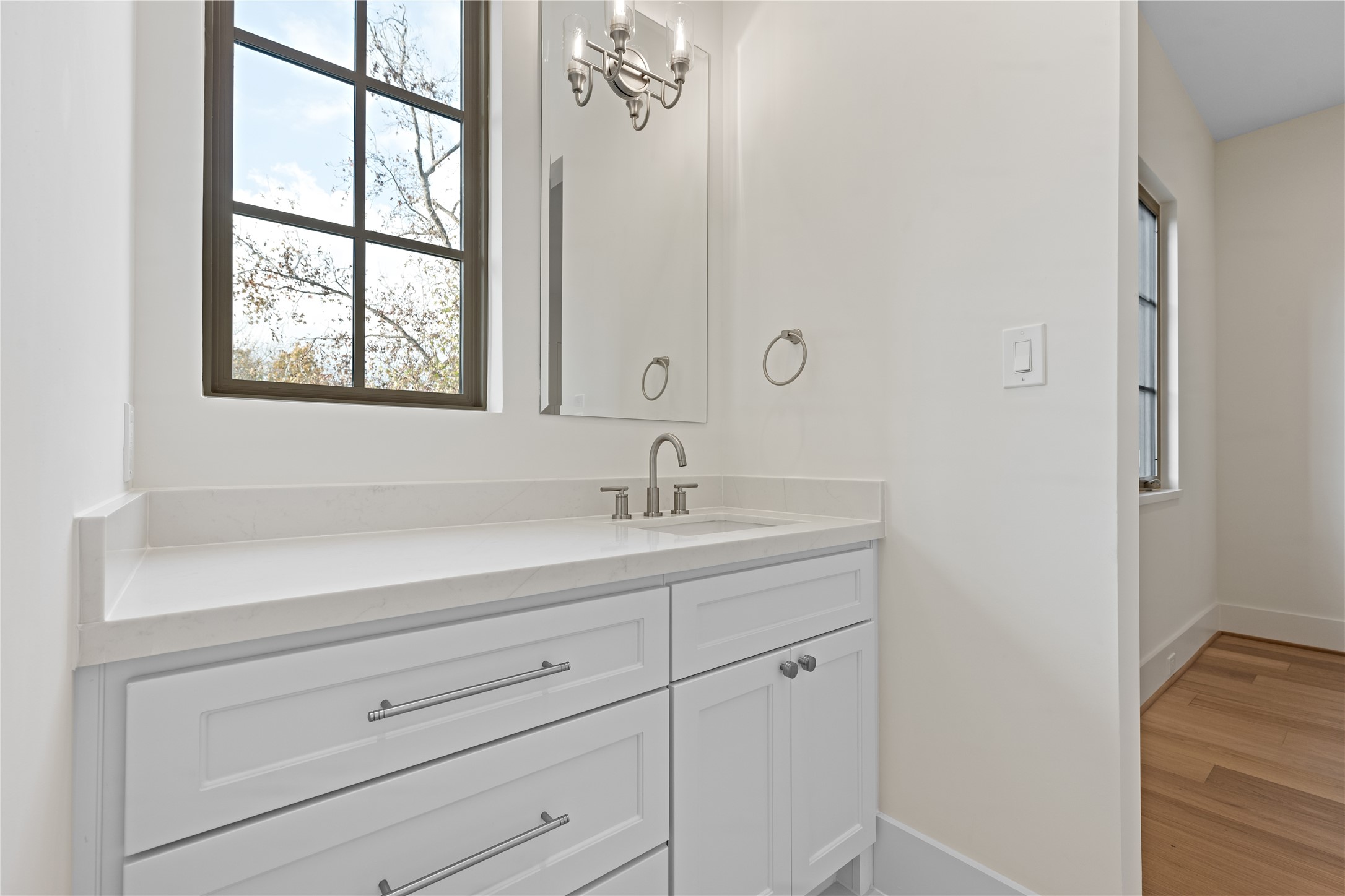 1441 Chamboard Lane Houston, TX 77018 - Photo 33 of 46 a bathroom with a sink and a mirror