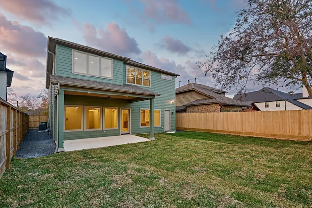 a close view of a sink a shower and a mirror