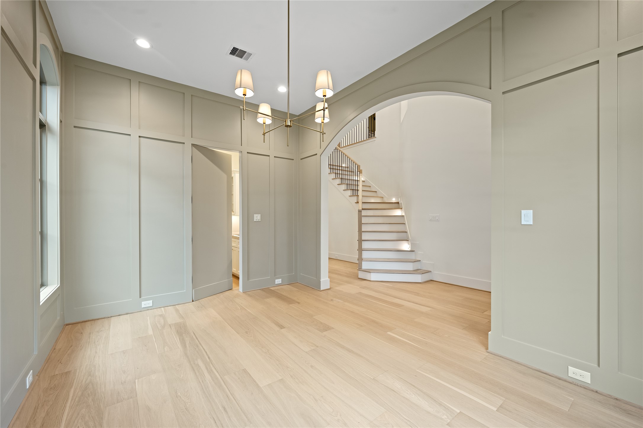 1441 Chamboard Lane Houston, TX 77018 - Photo 6 of 46 a view of a livingroom with a chandelier