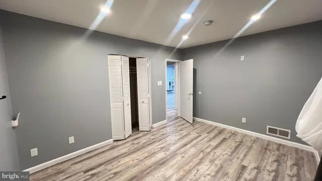 a view of a livingroom with bathroom