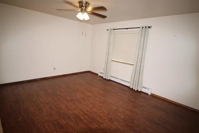a bathroom with a sink toilet and tub