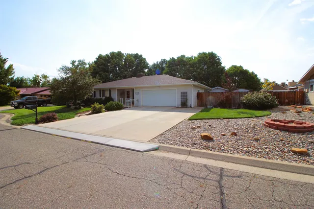 a view of house with outdoor space and street view