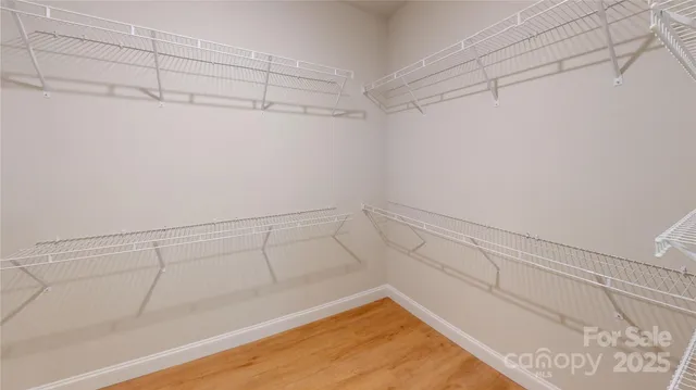 a view of a room with racks on the wall