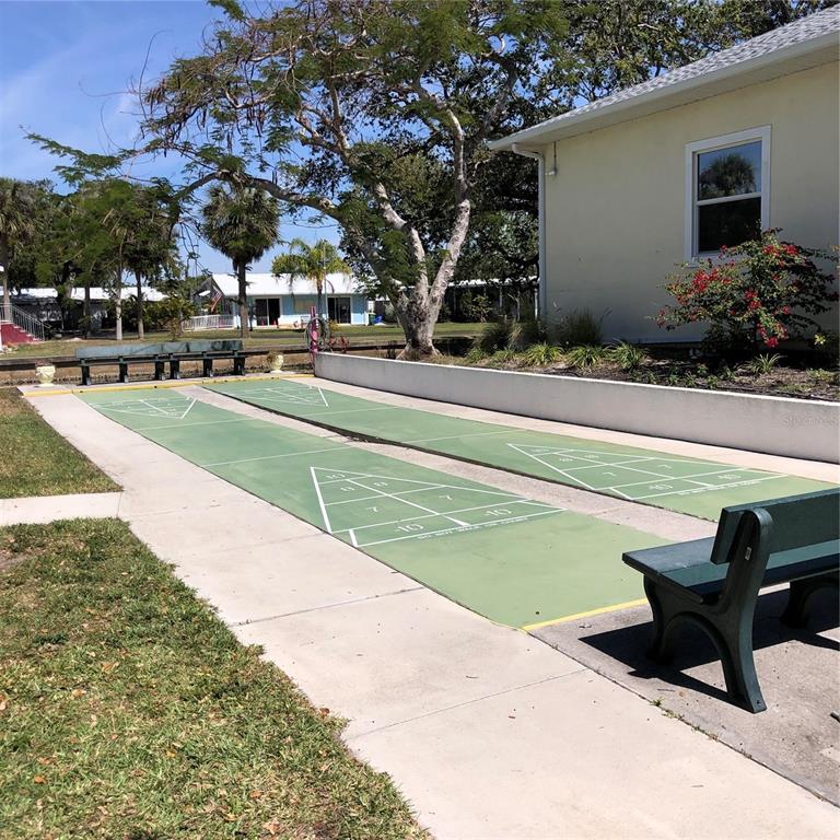 24437 Harbor View Road, Unit 12 Port Charlotte, FL 33980 - Photo 29 of 36 a view of outdoor space yard and patio