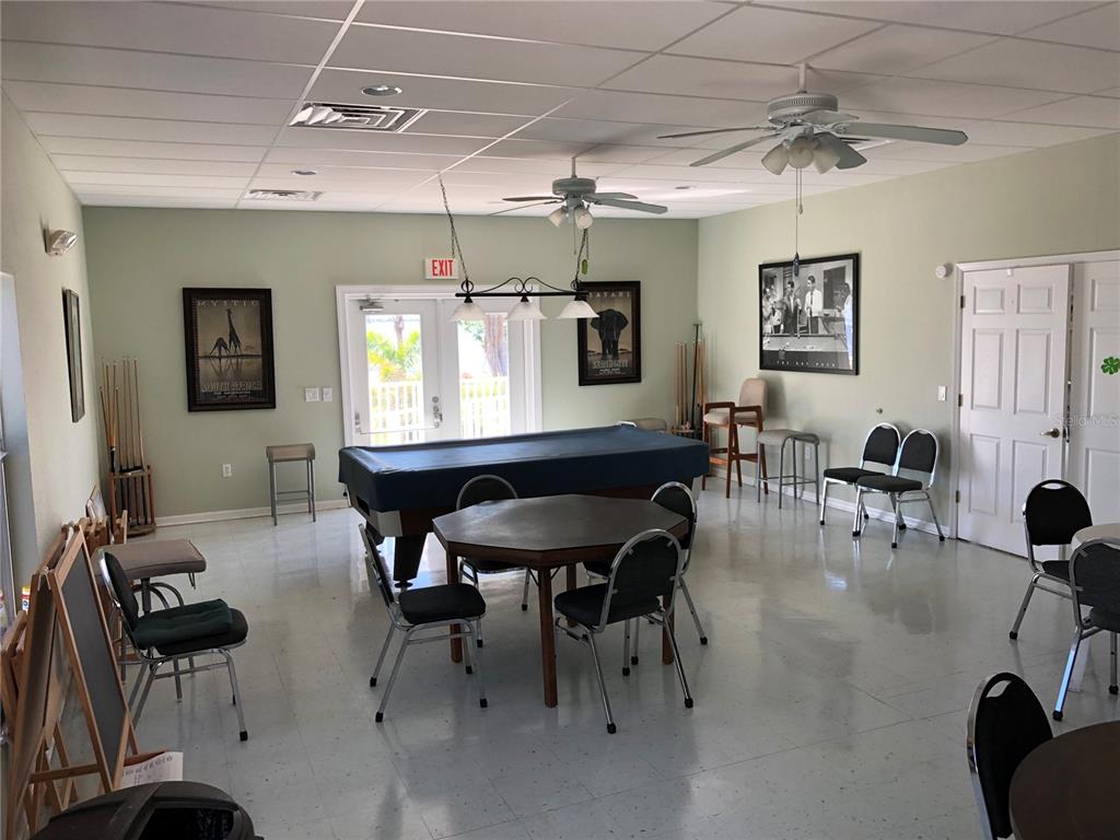 24437 Harbor View Road, Unit 12 Port Charlotte, FL 33980 - Photo 32 of 36 a view of a livingroom and dining room