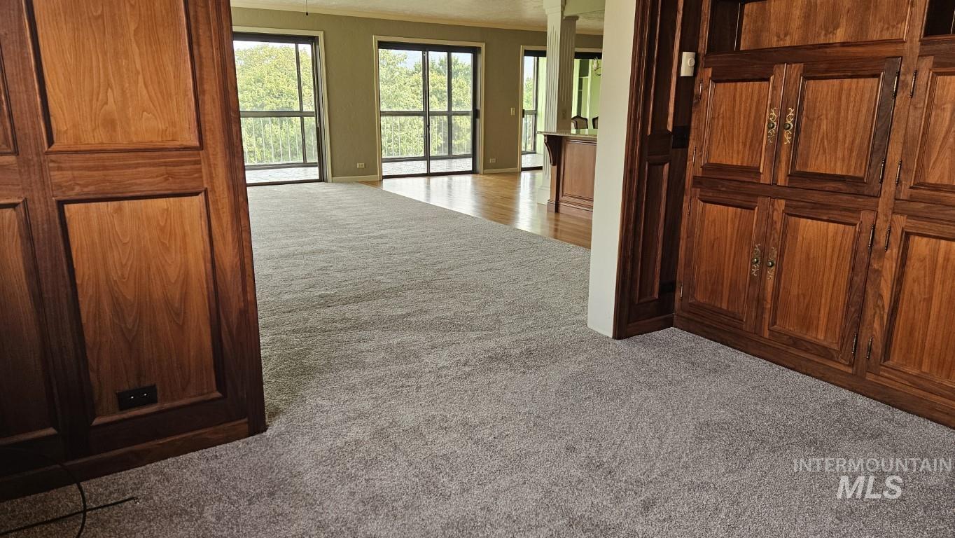 3100 Crescent Rim Drive, Unit 308 Boise, ID 83706 - Photo 6 of 34 Corridor featuring dark colored carpet