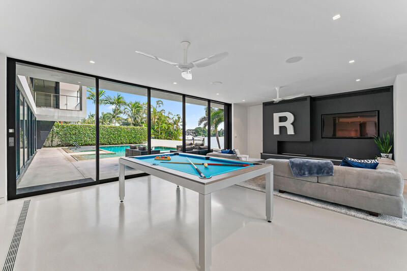 5706 Holly Lane Jupiter, FL 33458 - Photo 13 of 34 Recreation Room-Sliders to Pool Terrace