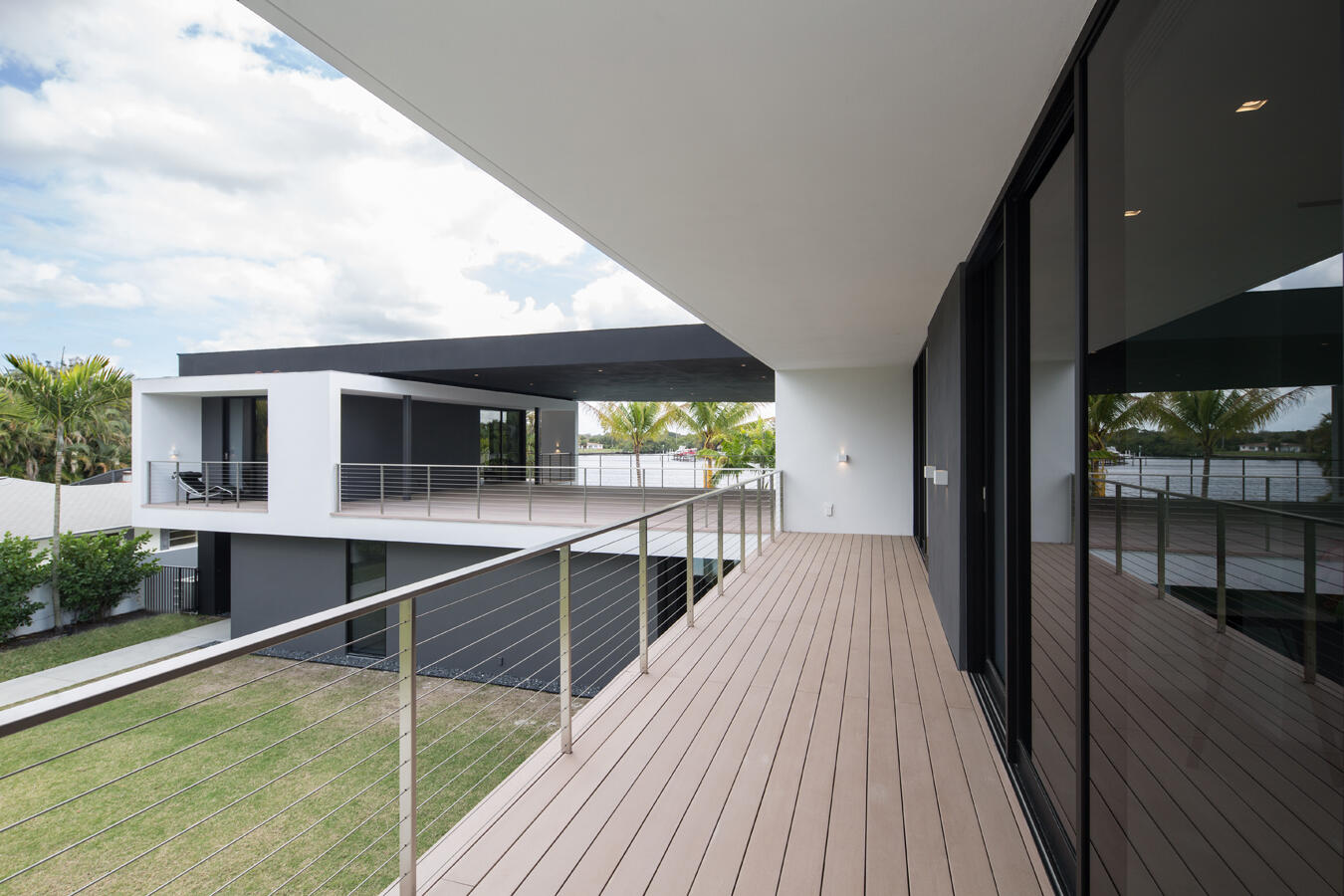 5706 Holly Lane Jupiter, FL 33458 - Photo 20 of 34 Balcony-Off of Second & Third Bedrooms