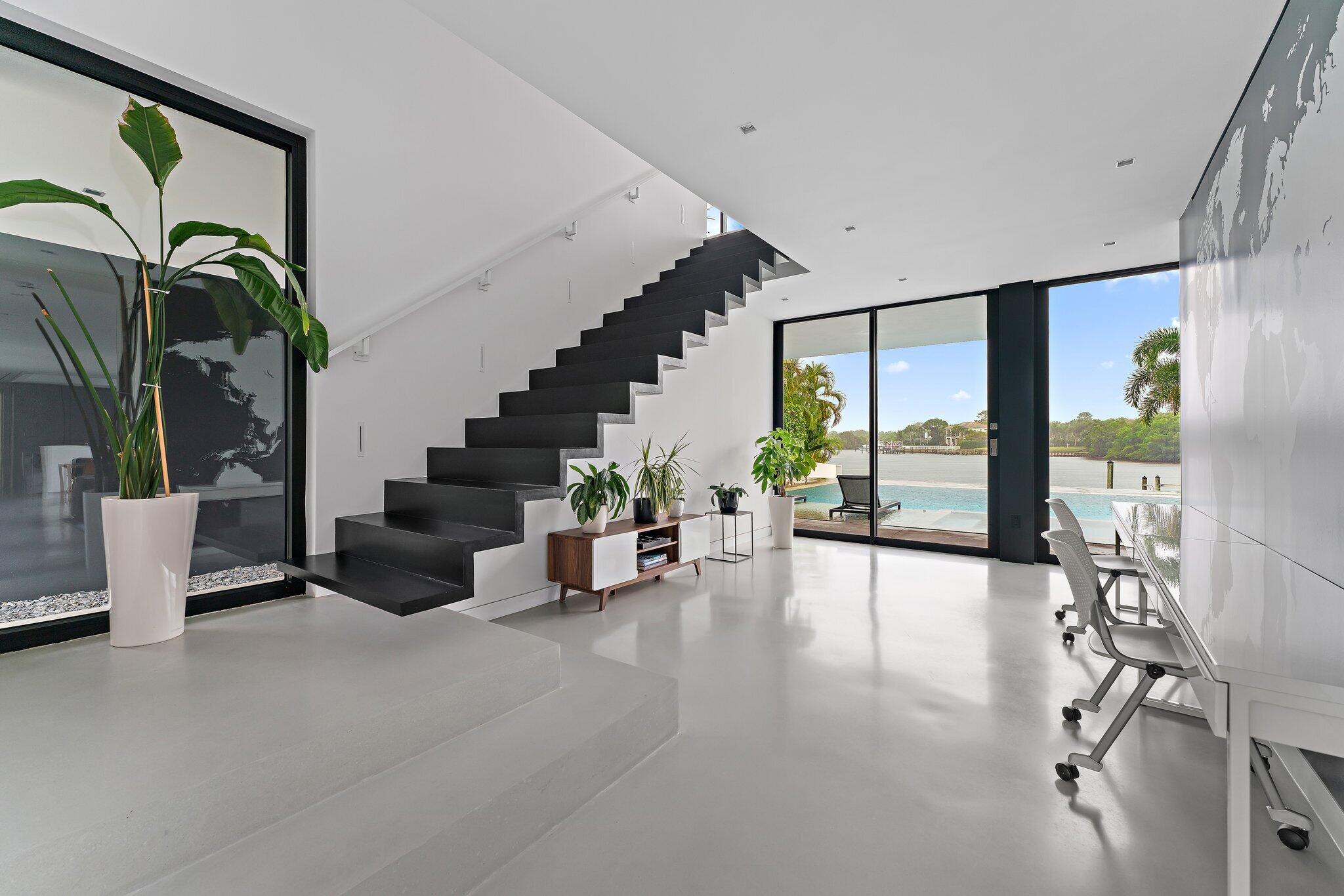 5706 Holly Lane Jupiter, FL 33458 - Photo 21 of 34 Office Area/Stairs to Guest Wing