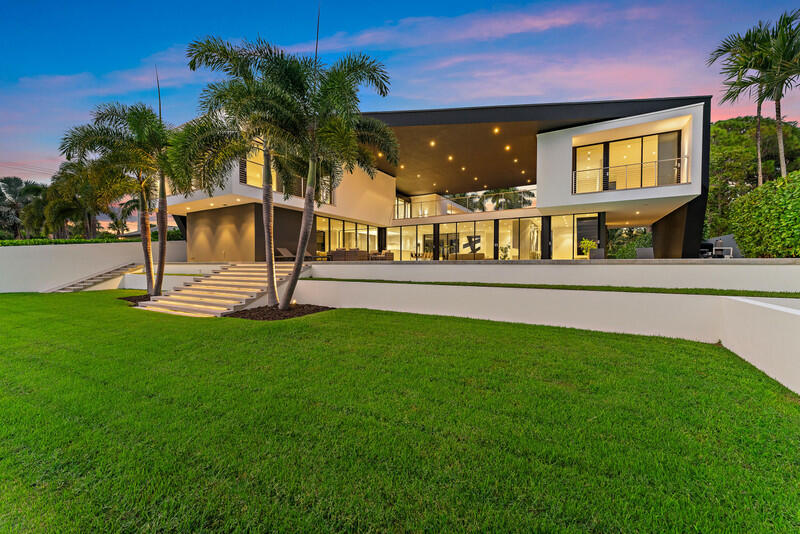 5706 Holly Lane Jupiter, FL 33458 - Photo 30 of 34 View of rear of home from private dock