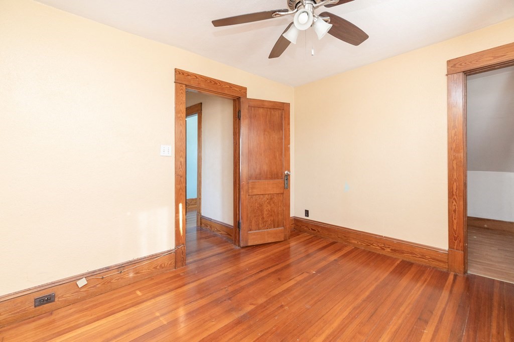 60 Roy Street Chicopee, MA 01013 - Photo 29 of 39 a view of an empty room with wooden floor