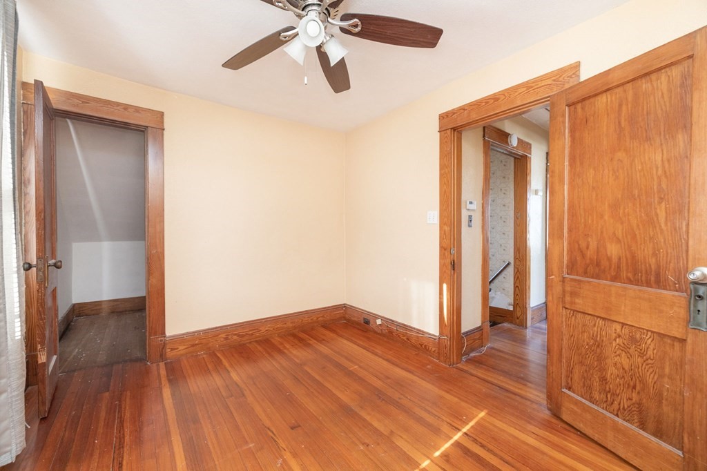 60 Roy Street Chicopee, MA 01013 - Photo 30 of 39 a view of empty room with wooden floor and fan
