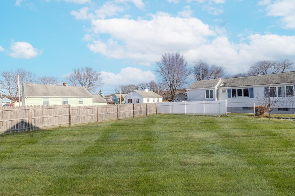 60 Roy Street Chicopee, MA 01013 - Photo 38 of 39 a swimming pool with trees in front of it