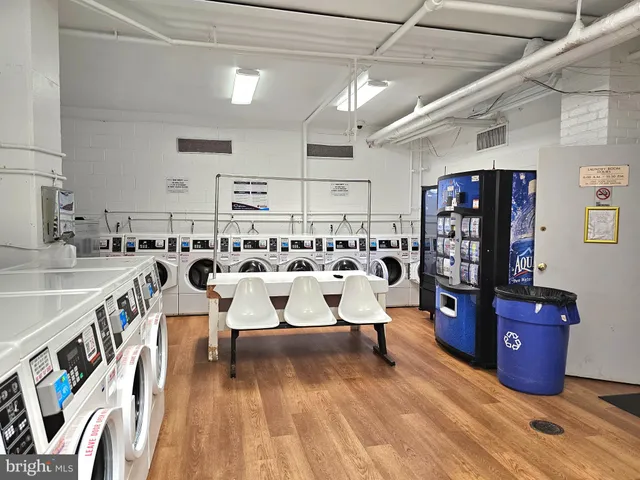 a view of a two chair and tables in the patio