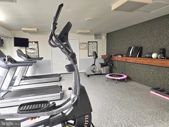 a view of a room with gym equipment
