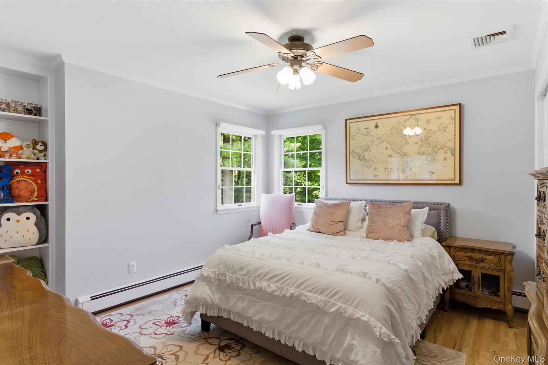 6 Brandy Road Cold Spring Harbor, NY 11724 - Photo 17 of 25 a bedroom with a large bed and a window