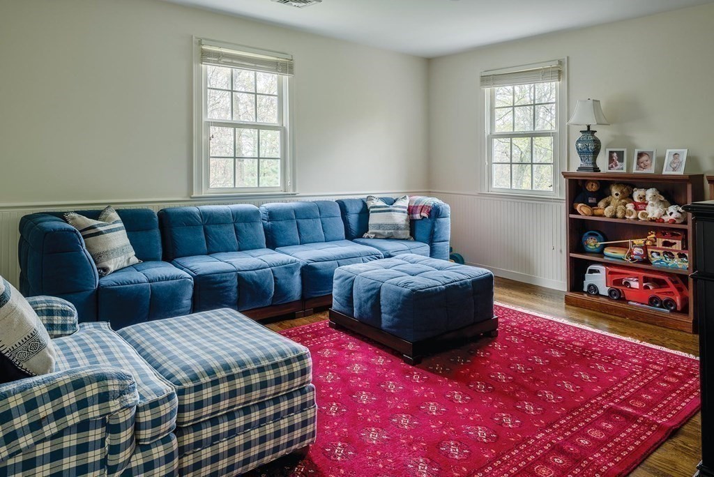 6 Oak Hill Road Needham, MA 02492 - Photo 14 of 18 a living room with furniture and book shelf