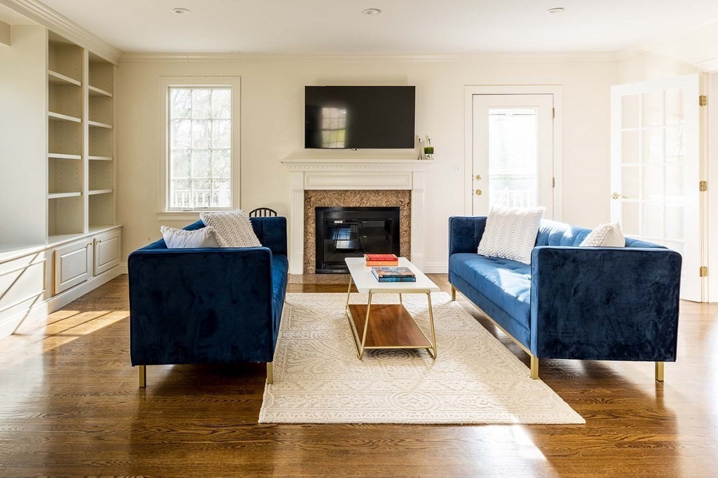 6 Oak Hill Road Needham, MA 02492 - Photo 4 of 18 a living room with furniture and a fireplace