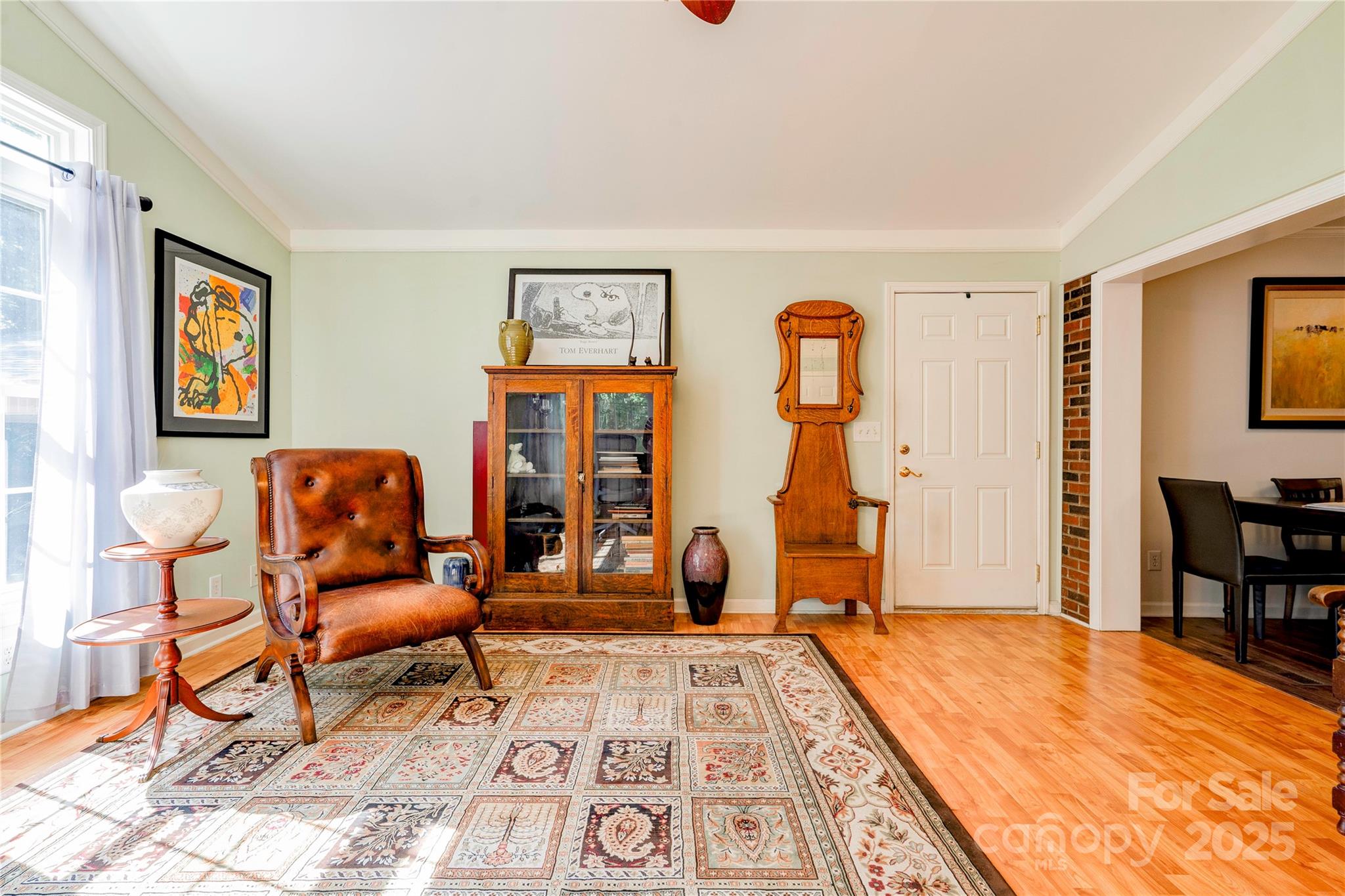 411 El Bethel Road Kings Mountain, NC 28086 - Photo 32 of 42 a living room with furniture and a wooden floor