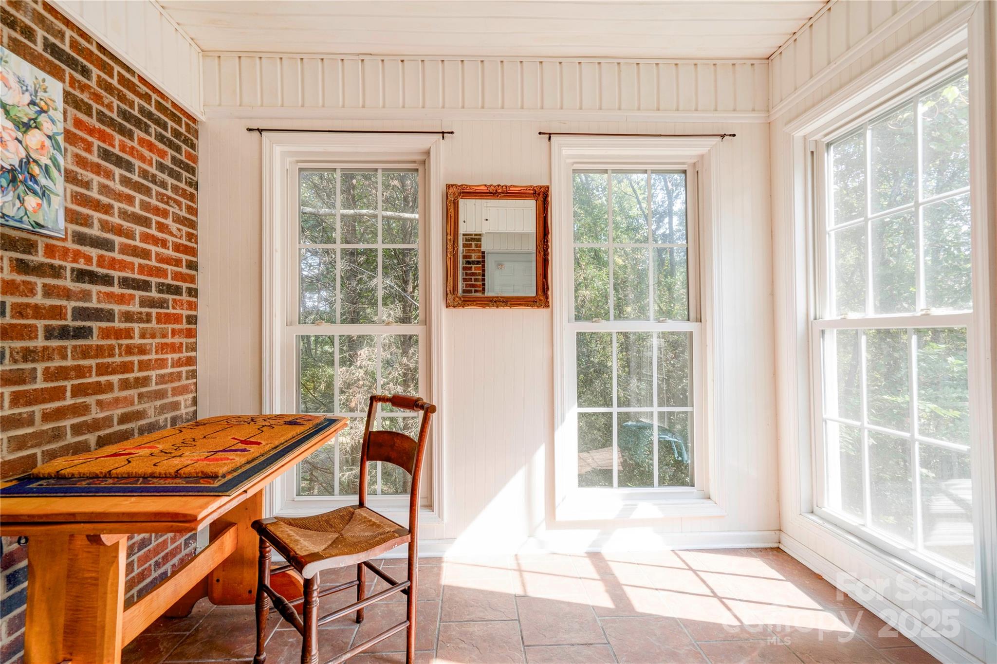 411 El Bethel Road Kings Mountain, NC 28086 - Photo 33 of 42 a backyard of a house with a table and chairs
