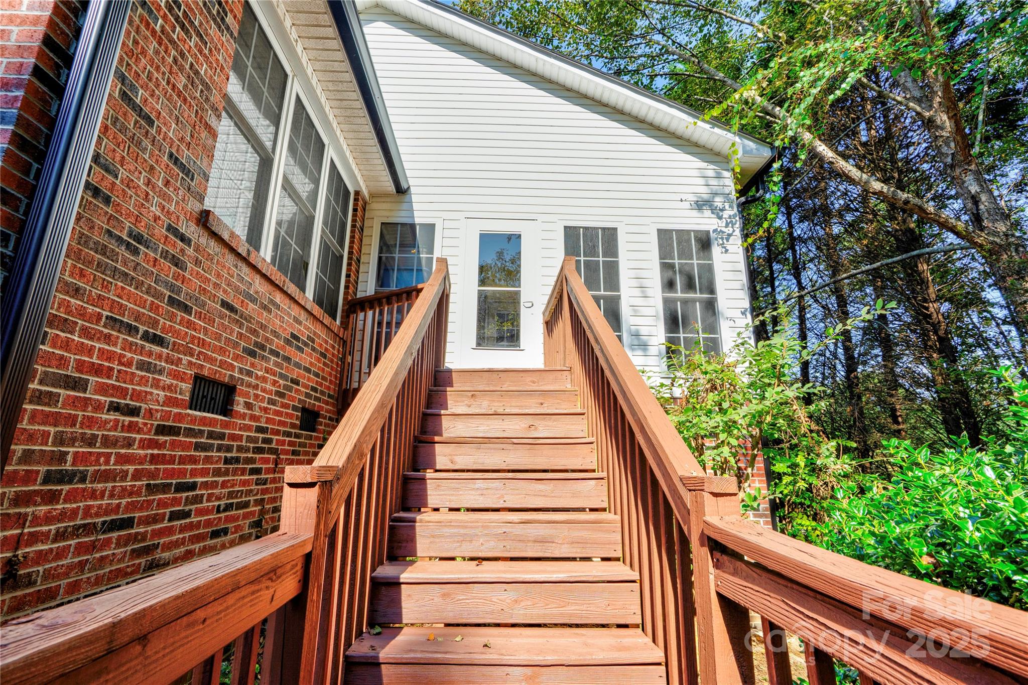 411 El Bethel Road Kings Mountain, NC 28086 - Photo 36 of 42 a view of a large building with wooden stairs