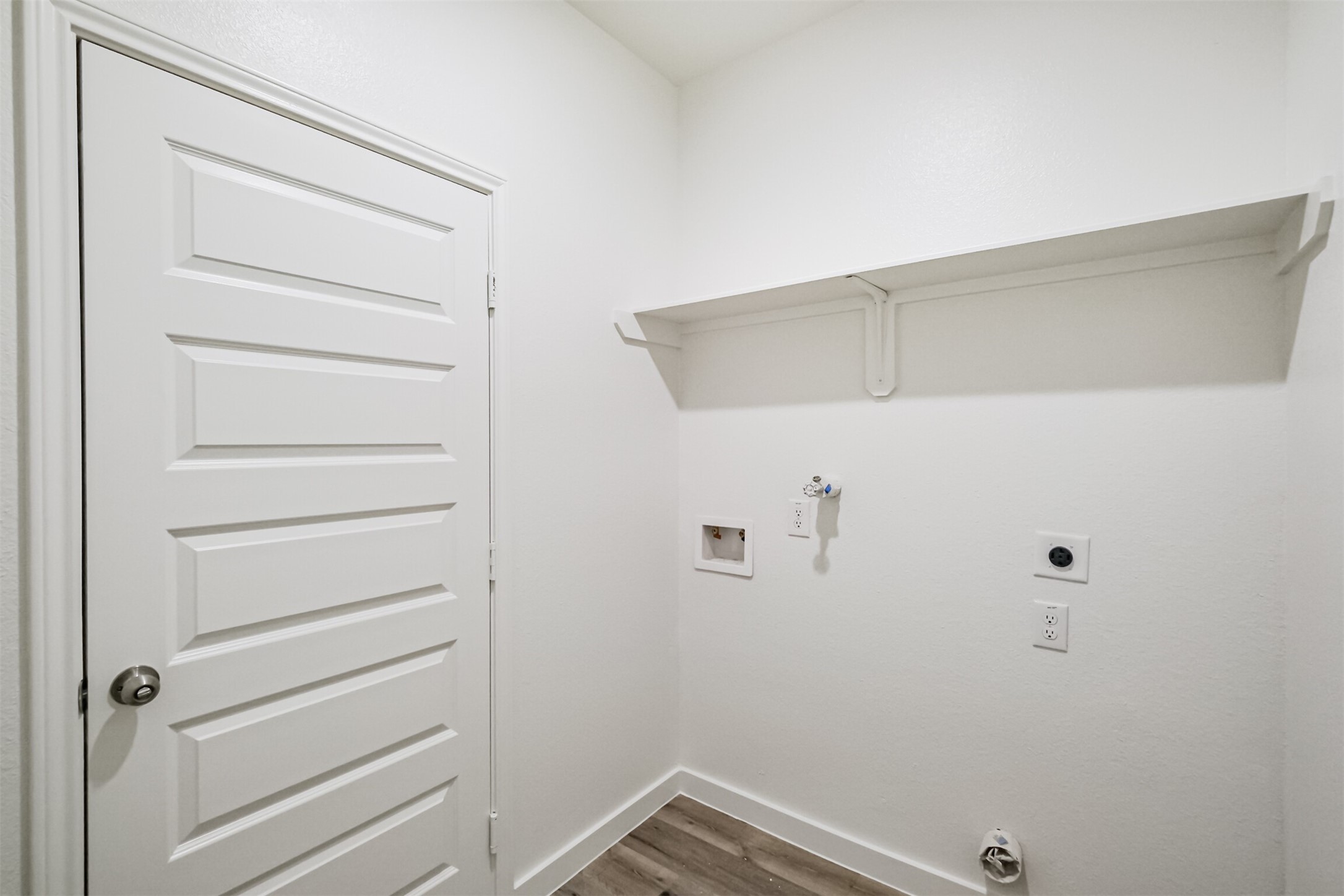 703 Majestic Eagle Court Houston, TX 77090 - Photo 18 of 40 a view of an empty walk in closet