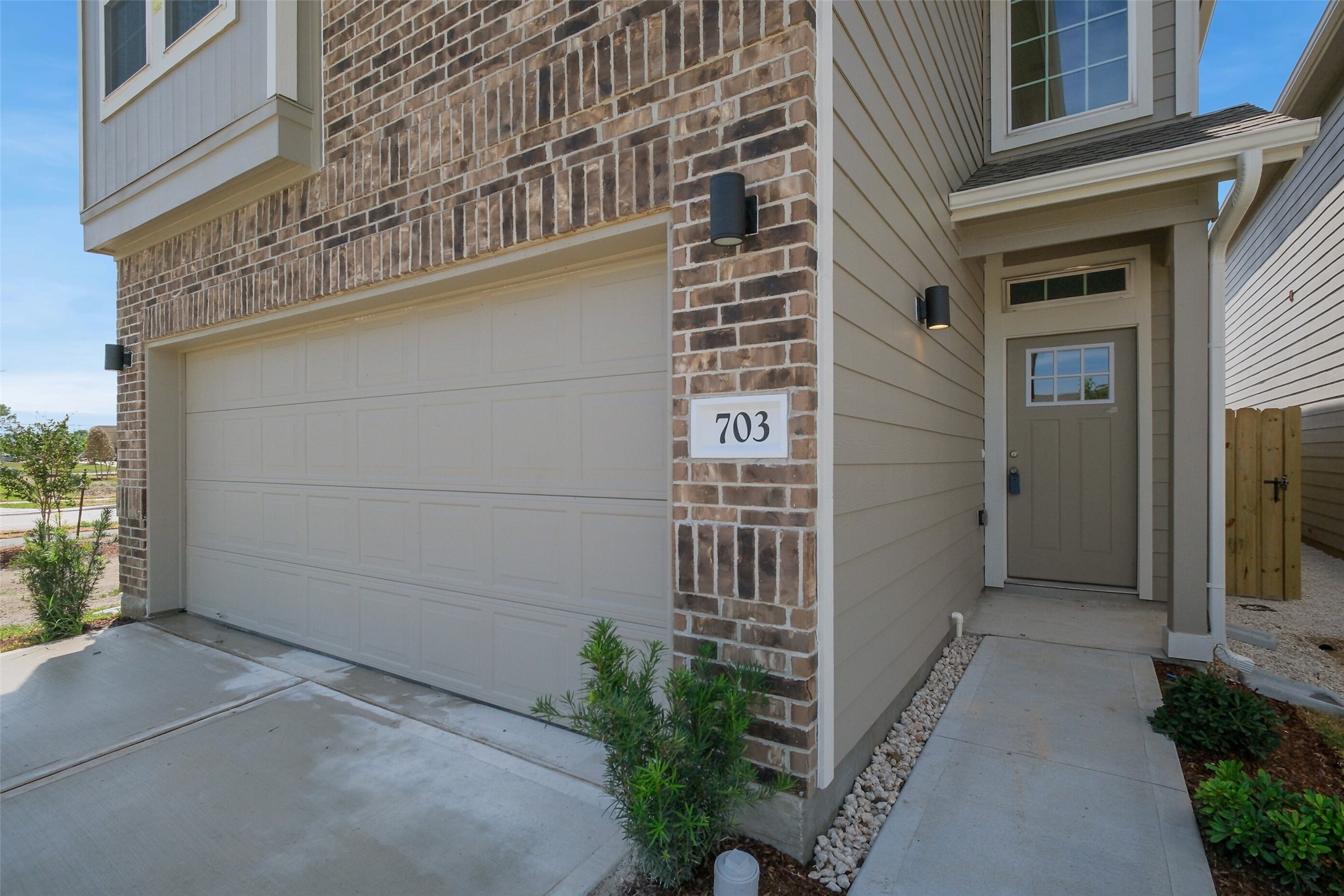 703 Majestic Eagle Court Houston, TX 77090 - Photo 3 of 40 view of a pathway along the building