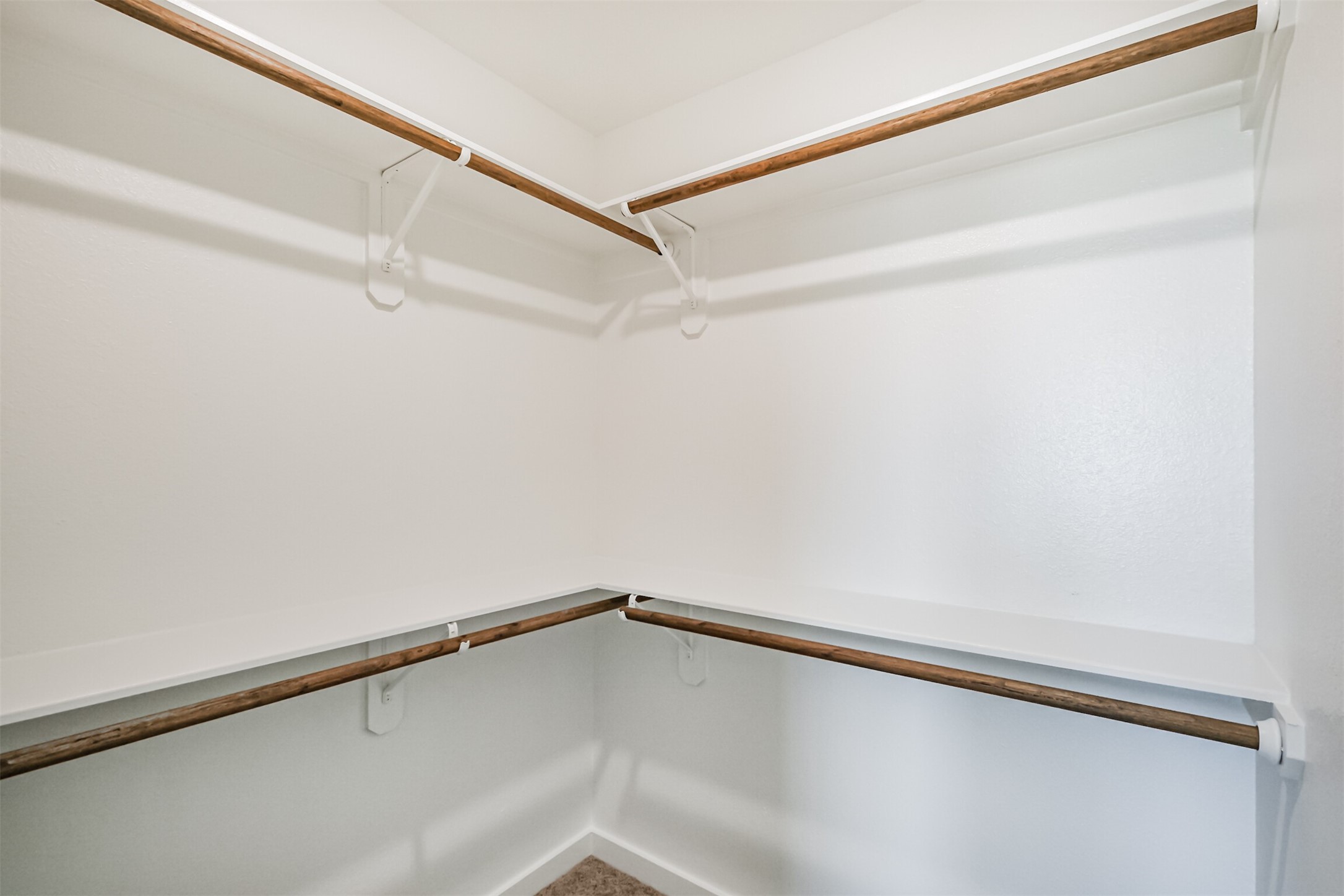 703 Majestic Eagle Court Houston, TX 77090 - Photo 33 of 40 a view of a room with racks on the wall