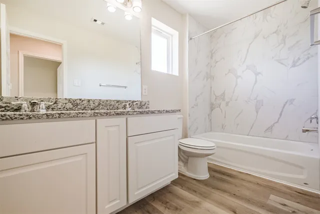 a backyard of a house with lots of green space